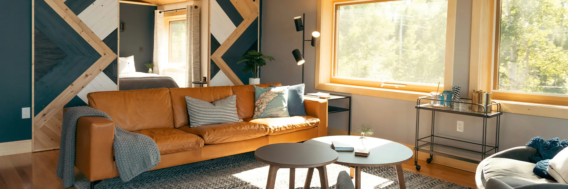 Interior design workspace with fabric swatches and color samples.