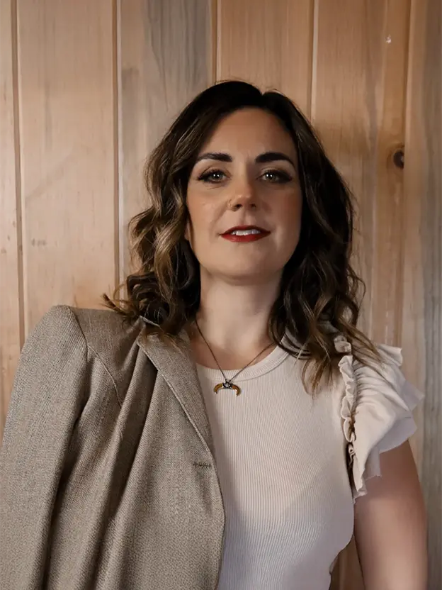 Cozy living room with neutral tones and natural light.