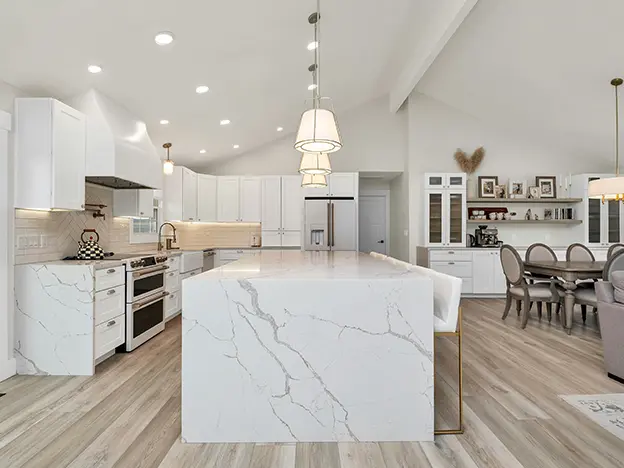 Kitchen with curated furnishings and lighting.